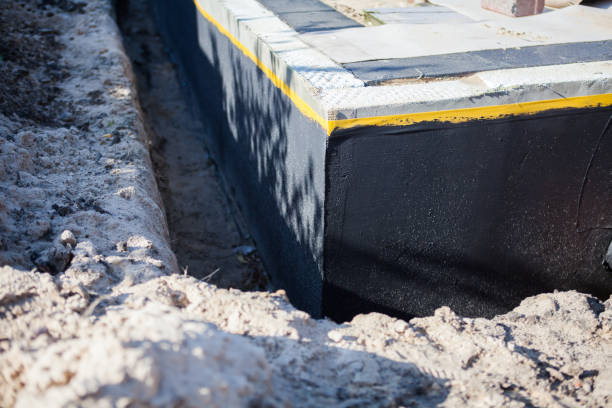 Professional Waterproofing technician working in Hermitage, PA